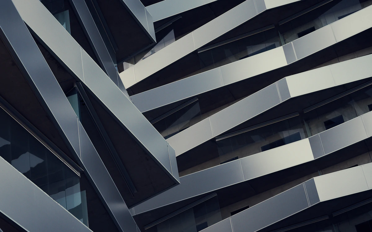 low angle photography of gray building at daytime