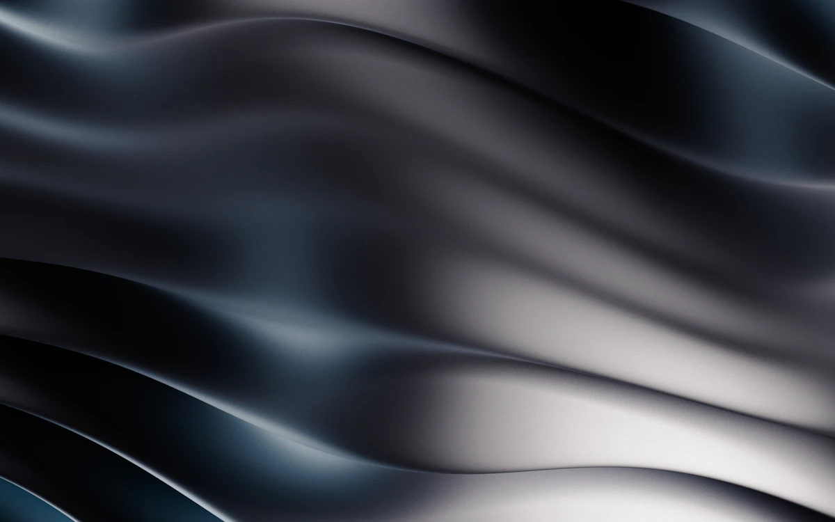 a black and white background with wavy lines