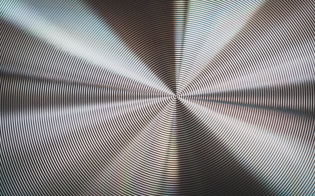 a black and white photo of a circular object