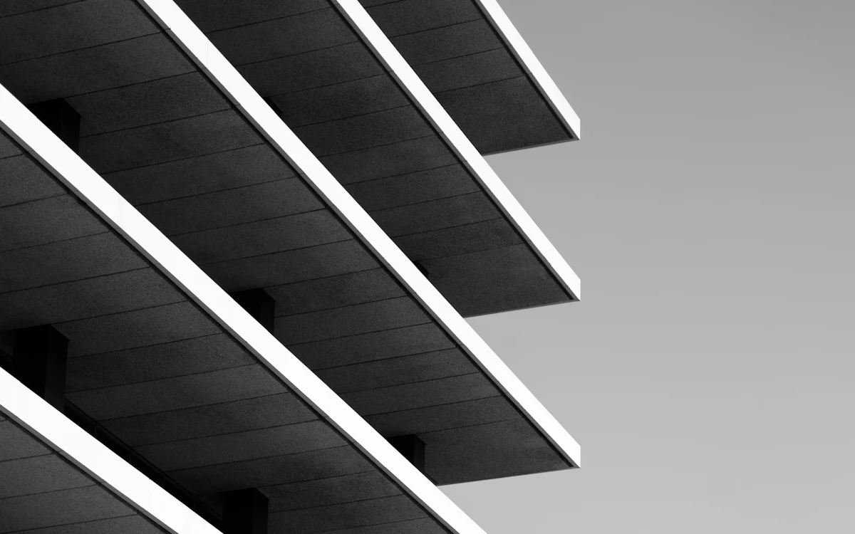 greyscale photo of high rise building